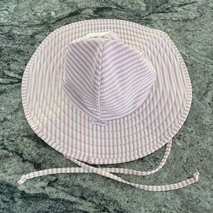 Baby 0-12 month RuffleButt sun hat. Gently used condition.